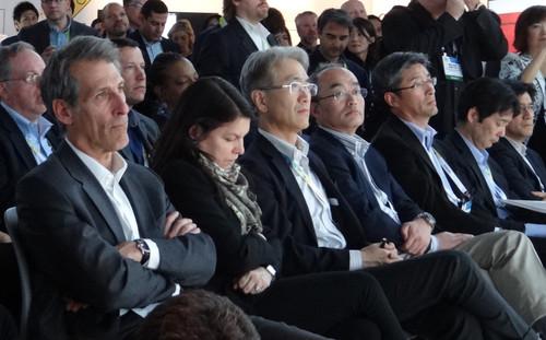 Michael Lynton (far left), president of Sony Pictures, watches Sony CEO Kaz Hirai speak about the hack of Sony Pictures during an event at CES 2015 in Las Vegas on January 5, 2015