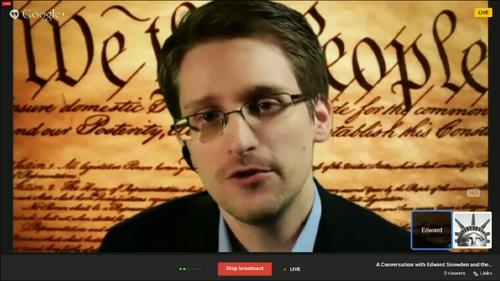 Edward Snowden speaks via video link to the SXSW conference on March 10, 2014